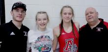 The Ainsworth Girls Wrestling Team competed in District competition on February 3rd and 4th in Bridgeport, NE. Jolyn Pozehl was crowned district champ in the 115 lb. weight class. Megan Jones took second place in the 140 lb. weight class. Both girls will represent Ainsworth at the 2023 NSAA State Wrestling Tournament in Omaha on February 16th, 17th and 18th. Pictured (Left to Right) are Assistant Coach Oren Pozehl, Joyln Pozehl, Megan Jones and Head Coach Todd Pollock.