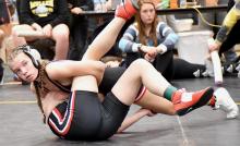 Jolyn Pozehl defeated Chloe Schaeffor of Sandhills Valley for first place in the 114 pound weight class.