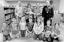 Ainsworth after school program students and staff and members of the Elks Club celebrated the donation to the ASAP program on Monday, November 25.