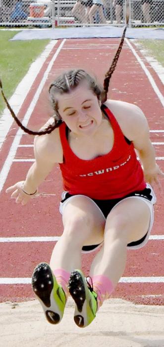 Emma Sears strives for a jump that would qualify her for a spot in the finals of the Long Jump at Districts.