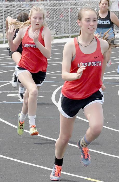 Preselyn Goochey (left) and Terrin Barthel (right) competed in the 400 Meter Run at Districts.