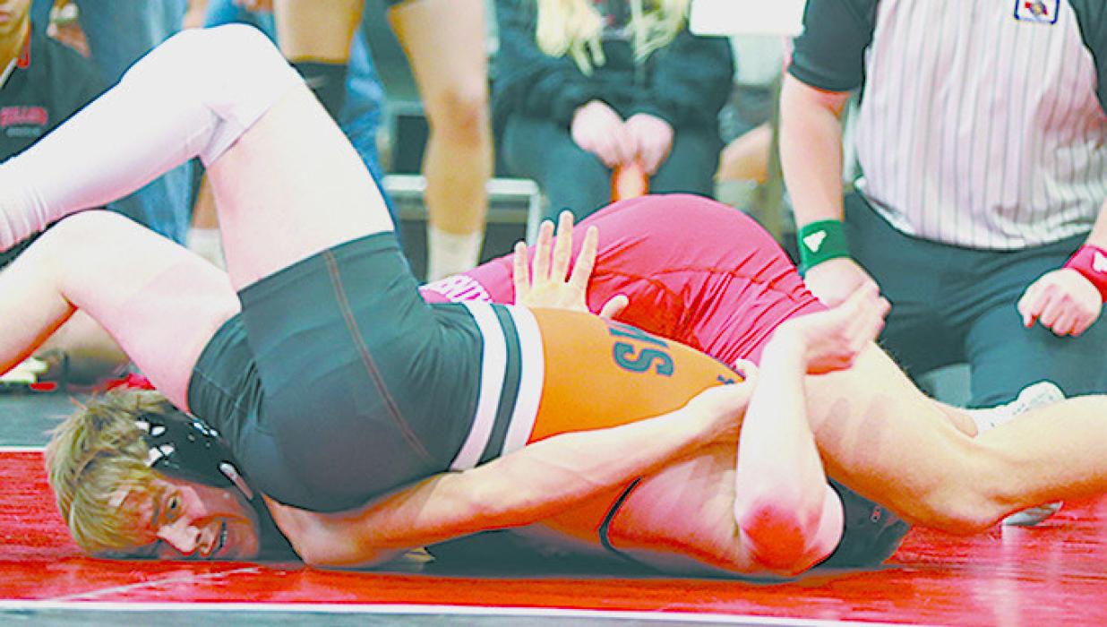 Aiden Jackman placed fourth in the 165 lb. weight class at the Ainsworth Invitational. Photos by Debb Gracey