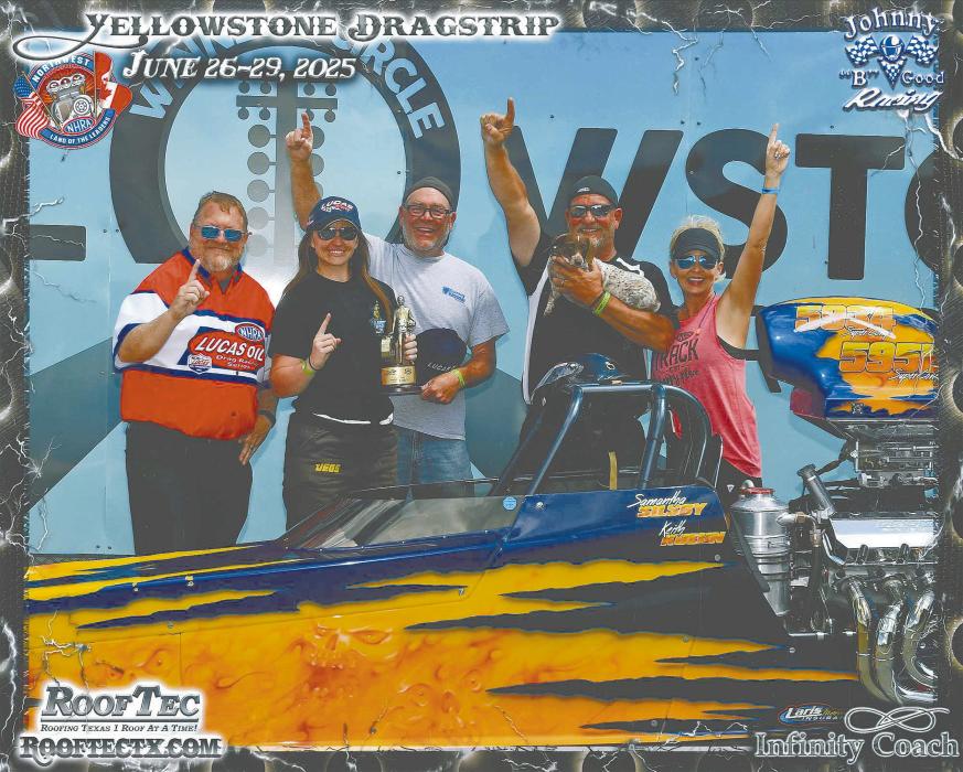 Samantha Kuehn celebrates behind her car with an NHRA Representative and her family (left to right): a member of the NHRA, Samantha Kuehn, her husband Keith Kuehn, father Mark VonHeeder, and mother Angie VonHeeder.