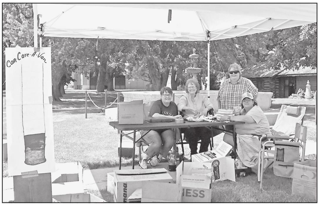 Brown County Family and Community Education (FCE) collected 2,517.2 pounds of food donations on Tuesday, June 15th at the Library Park in Ainsworth. Keya Paha County FCE held a Can Care-A-Van as well, and together the groups donated 2,747.2 pounds of food to the Ainsworth Food Pantry. Pictured above are several of the volunteers (left to right): Pam Bauer, Audrey Wilson, Cammie Waits and Phoebe McDaniel.