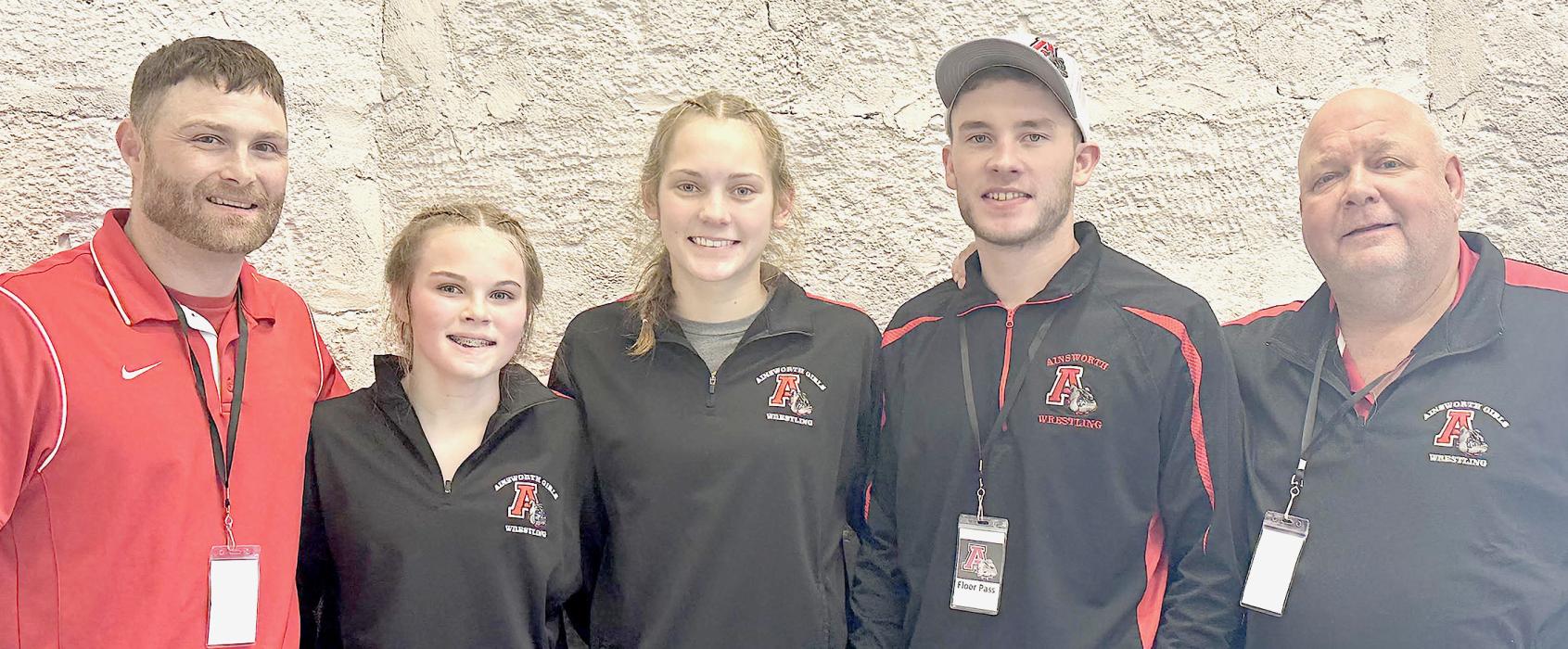 Congratulations to the Ainsworth High School State Girls Wrestling Qualifiers, Paisley Hoffman and Megan Jones who will be competing in the 2025 NSAA Girls Wrestling Tournament. Their coaches this year were (Left to Right) Ryan Hoffman, Oren Pozehl and Todd Pollock.