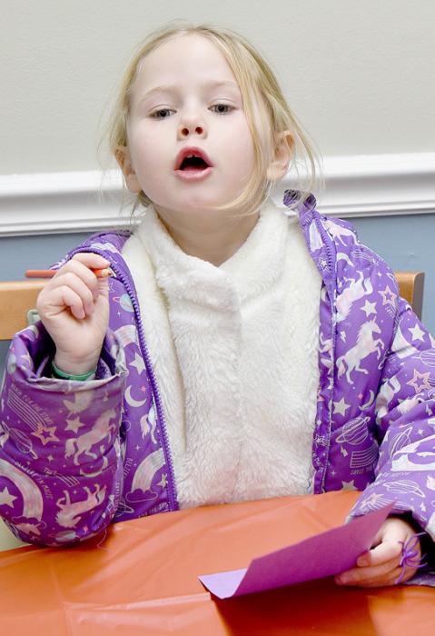 Ainsworth Students Help Brighten the Walls at Sandhills Care Center for the Holidays