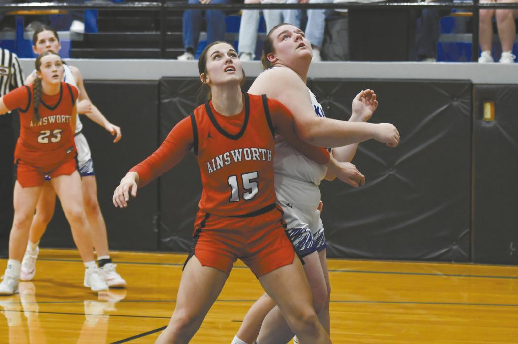 Junior Willa Flynn boxes out Karlene Kepler of North Central to gain position for a rebound.