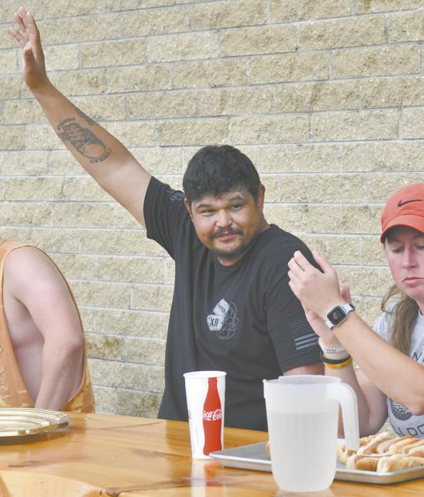 Christopher Johnson, of Ainsworth, won the hot dog eating contest hosted by the Elks. Johnson ate 13 hot dogs in seven minutes.