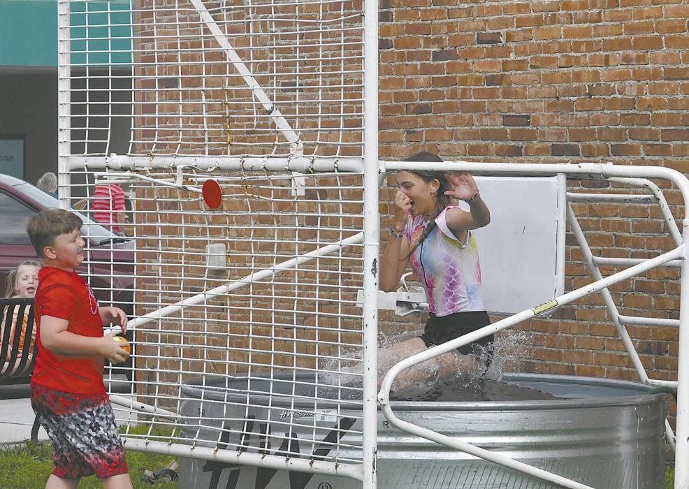As a storm rolled through on Friday afternoon, the Ainsworth Chamber of Commerce made the decision to not set up the inflatables, but left the dunk tank up, which got plenty of use.