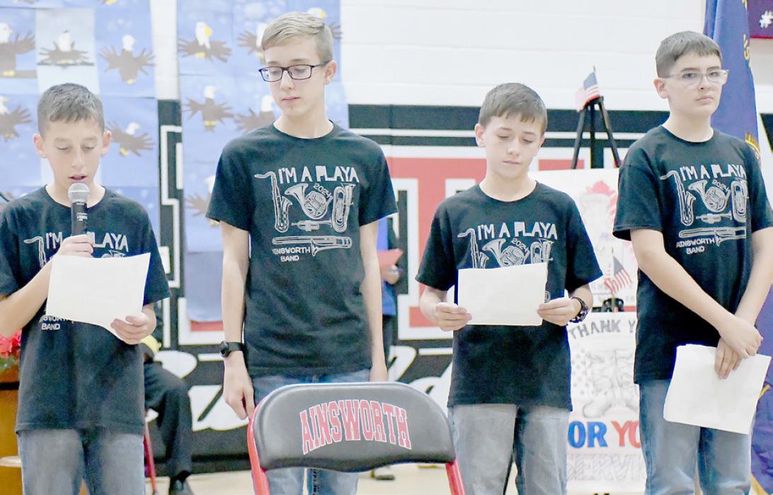 Presenting the history of Arlington National Cemetery were (left to right) The boys are Callen Pierce, Buck Ruhter, Maxwell Hasenohr, Leighton Konkoleski.