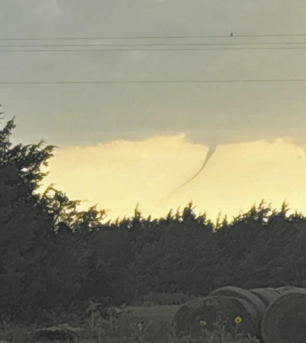 On Sunday, July 27, the tornado sirens sounded in Ainsworth. Several residents saw this funnel cloud drop down. The tornado was located in the Valentine National Wildlife Refuge. Shortly after being spotted, the tornado returned back into the sky. The city of Ainsworth did not receive any damage. (Photo Courtesy of Clint Painter)