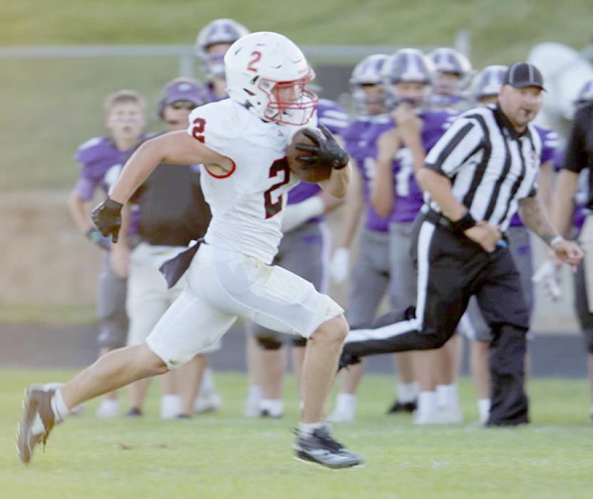 Morgan Kinney, #2, carried the ball 20 times for 92 yards and two touchdowns while catching six passes for 80 yards and one touchdown against Hartington-Newcastle. Photos by Debb Gracey