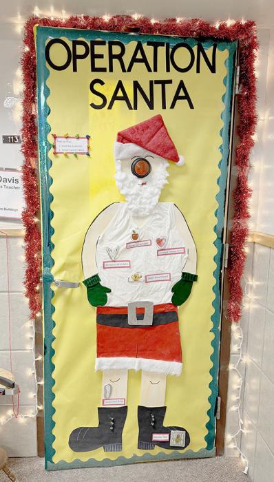 Coming in third place in the Middle School Door Contest was Mrs. Davis seminar door with “Operation Santa”.