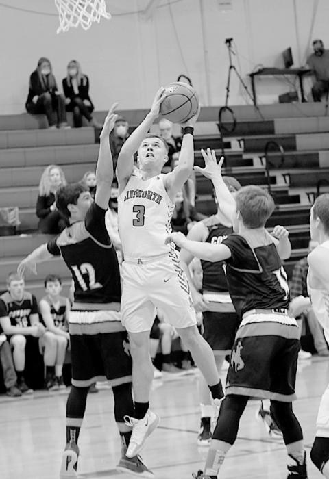 Cash Reynolds goes for two in Ainsworth’s final regular season game against Cody-Kilgore. Photos by Debb Gracey