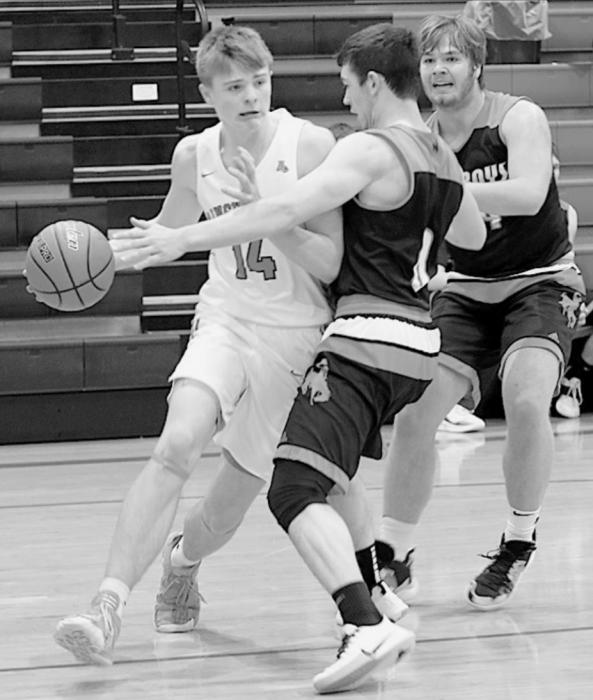 Carter Nelson drives the baseline against Cody-Kilgore.