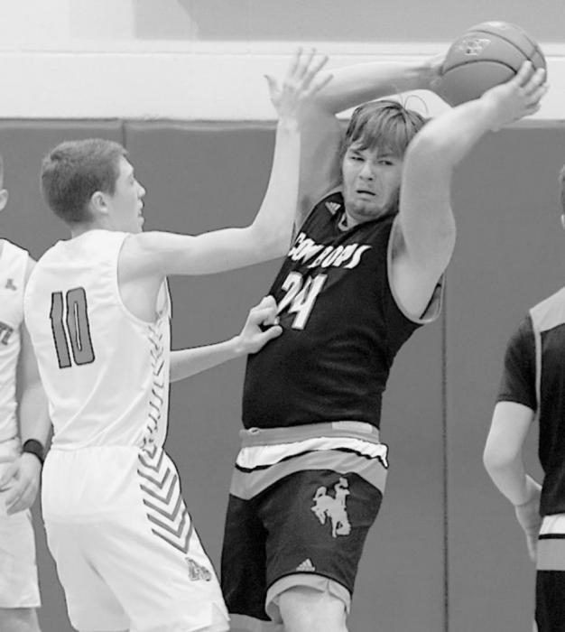 Ty Schlueter gets in the face of Cody-Kilgore’s Tucker Ravenscroft during Ainsworth’s win.