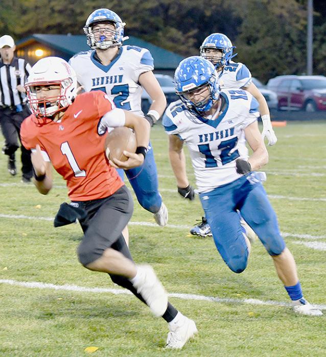 Chris Fernandez, #1, broke two long runs for Ainsworth touchdowns against the Kenesaw Blue Devils.