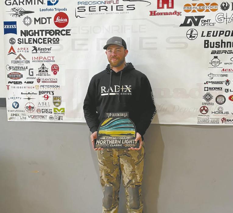 Derek Sherman was awarded a trophy for earning the title of Top Marksman during the Northern Lights Classic.