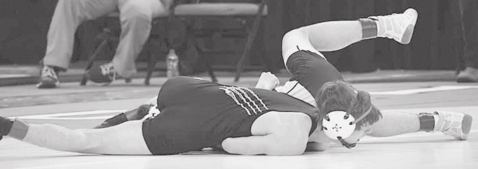 Tristin Grooms wrestled at 113 and won by a fall in Round 1.