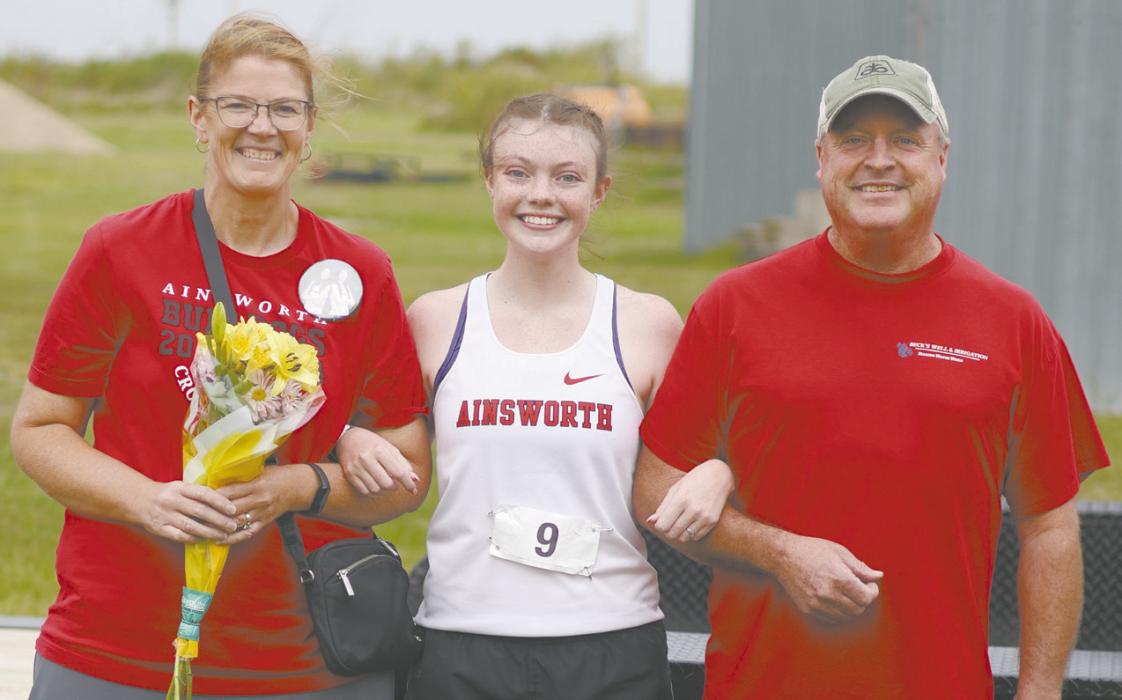 The Cross Country team also celebrated its seniors during the awards ceremony. Payton Moody is pictured above with her mother, Erin, and father, Jon.
