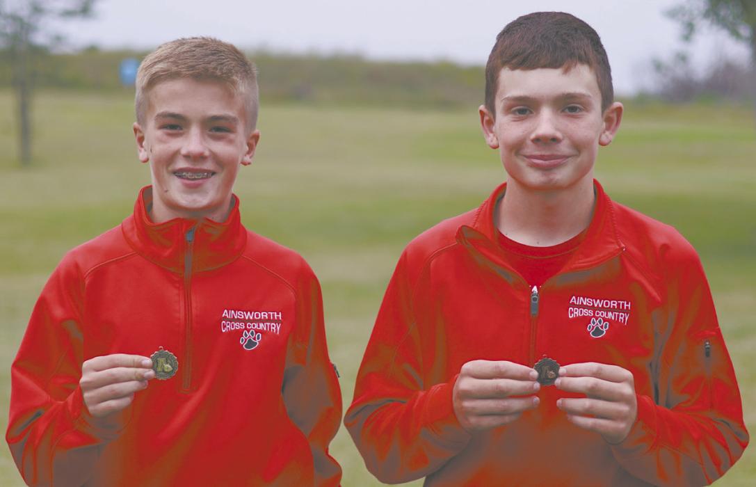 The Ainsworth Middle School Cross Country team also competed. Blake Hansmeyer (left) placed first overall, running the one mile race in 6:09, Mason Winters placed seventh, running a 6:30.
