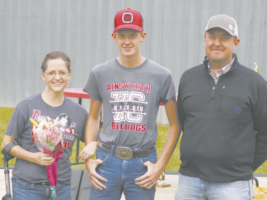 Kaden Seidel is the other senior on the cross country team this year. He is pictured above with his mother, Emily, and father, Jonathan.