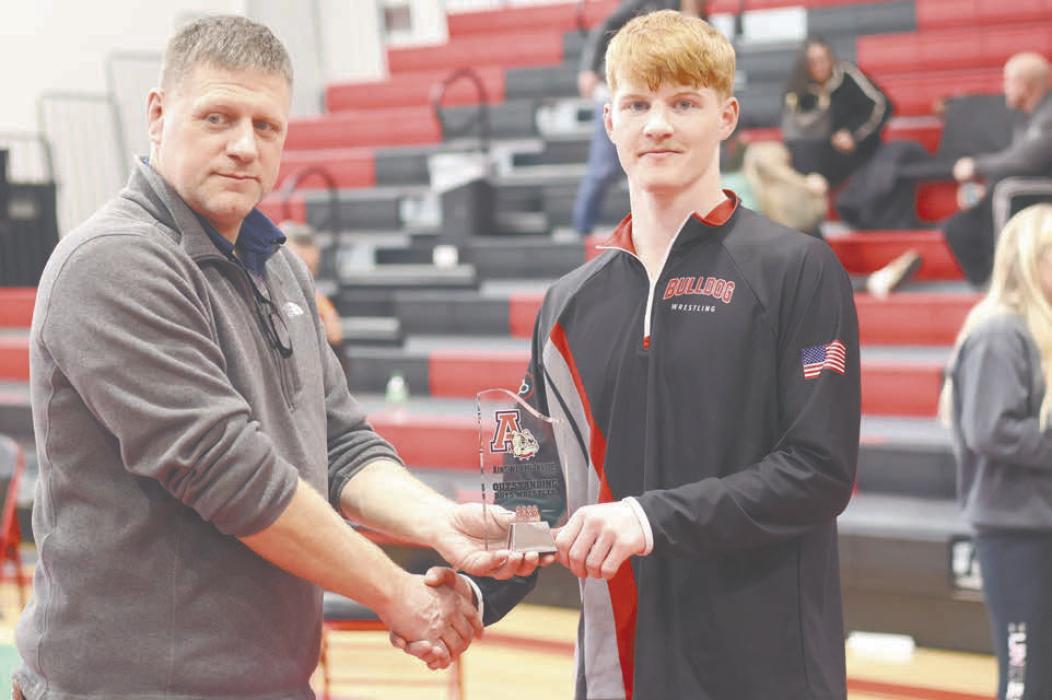 Senior wrestler Sam Titus was awarded the Outstanding Wrestler award during his final home invite of his career by Activities Director Luke Wroblewski. Titus won the tournament, going 3-0 on the day.