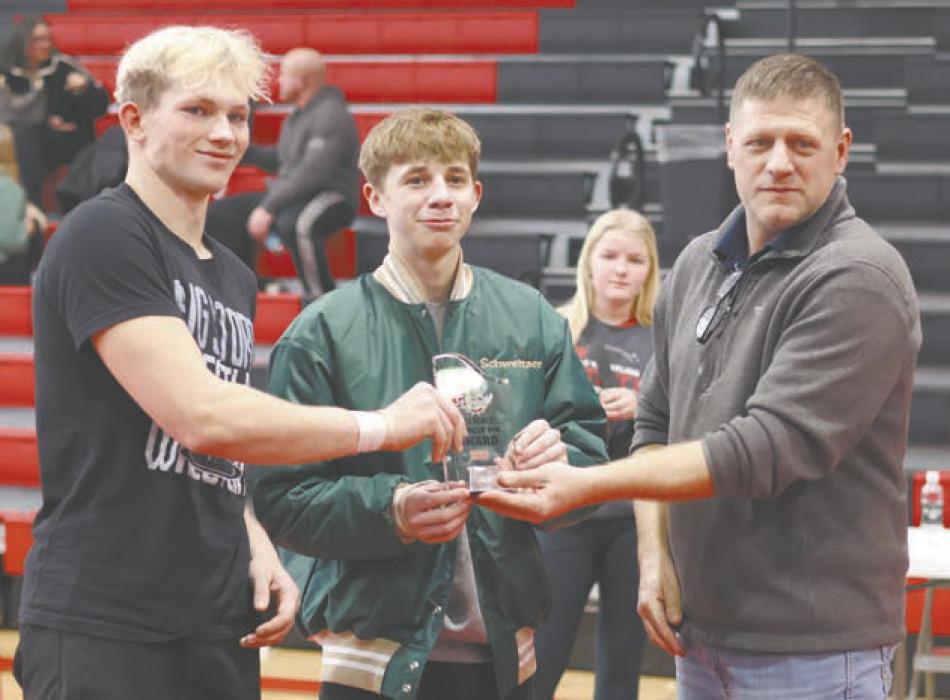 Mason Janek of Burke/Gregory (left) and Ace Schweitzer of Central City (center) were awarded the Fastest Pin award during the invite. Each wrestler pinned their opponent in 17 seconds.