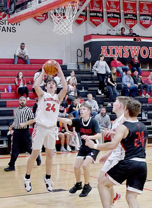 Ainsworth Freshman #24 Bear Rea and #31 Jaxon Rucker found playing time against the St. Mary’s Cardinals in the Jamboree Basketball Game on November 25th.