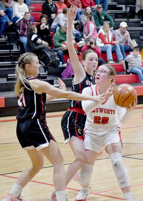Gracyn Painter looks for a shot against the St. Mary’s Lady Cardinals in the November 25th Jamboree game.