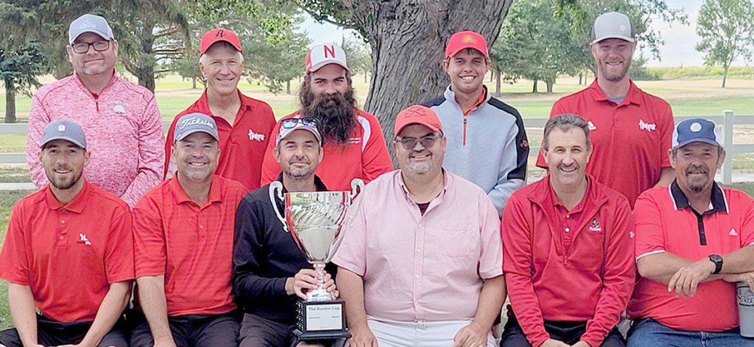 Ainsworth golfers retain the Border Cup by tying Bassett golfers in the annual event 12 1/2 to 12 1/2. Ainsworth team members were (back row left to right) Tony Allen, Joel Klammer, Robert Magill, Kyle Jackman, Kirk Peterson; (front row left to right) Logan Leach, Kevin Martin, Cody Goochey, Graig Kinzie, Doug Weiss and Todd Kicken.