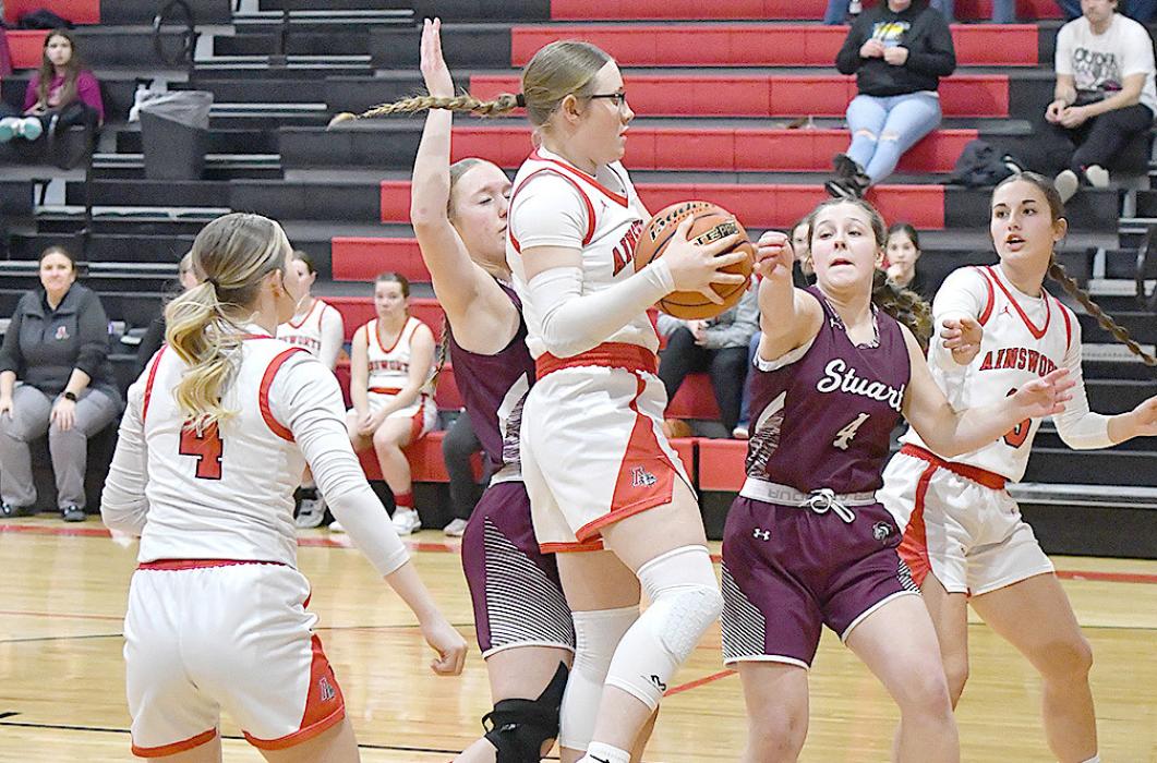 Gracyn Painter pulls down an offensive rebound on her way to another double-double.