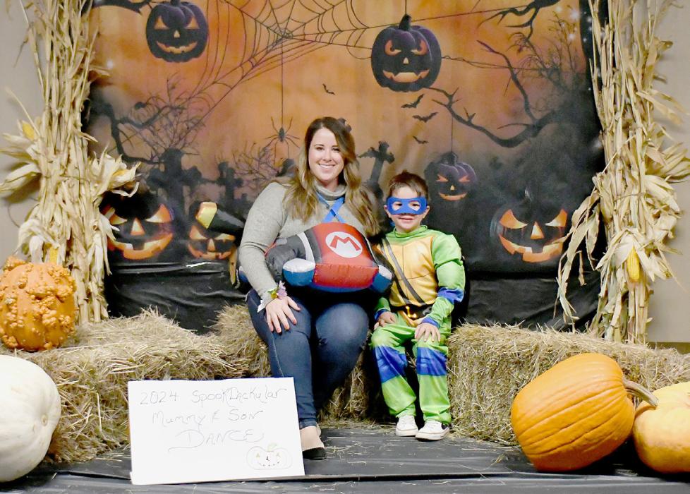 Jennifer and Gavin Marlatt took time to have their photo taken during the Spook-tacular Mummy and son Dance for a remembrance of the evening.