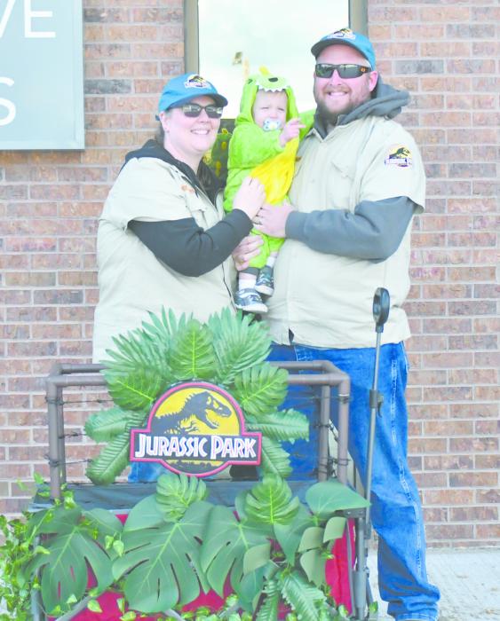Many families took part in the Ainsworth and Long Pine trick or treat streets this year. Pictured above are Christyna and Tim Johnson with their son, Thomas, who dressed as a dinosaur and Jurassic Park crew members during Ainsworth’s event.