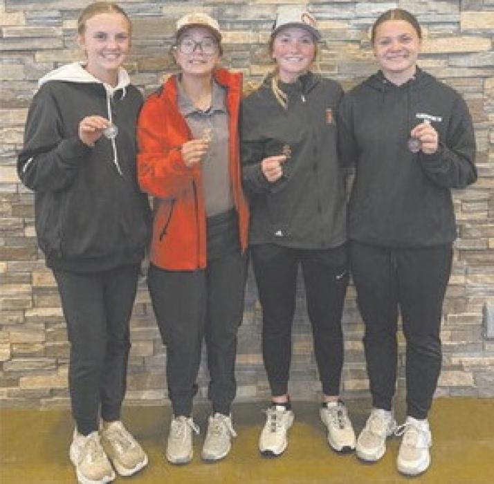 Photo Courtesy of Heather Lutter Bulldog medal winners at the Valentine Invite include (left - right): Gracyn Sisson, Madison Palmer, Kenley Welke and Makenna Koch.