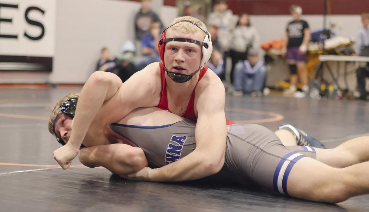 Easton McMillin works to pin his opponent, Jack Kucera of Ravenna. He took home a fourth place medal from the Twin Loup Invite.