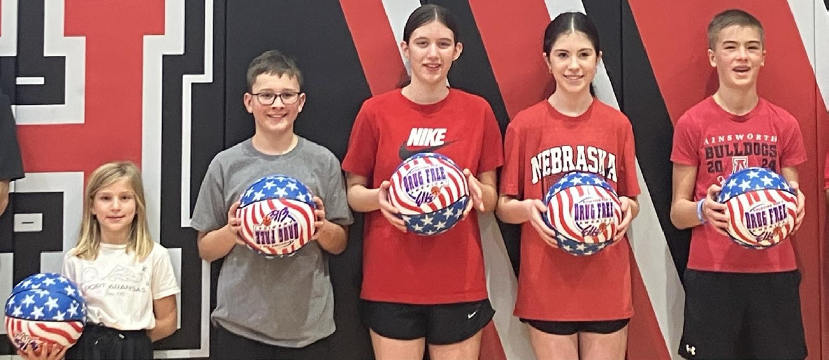 Local youngsters competed at the Ainsworth Elks Hoop Shoot held on December 7. Pictured above are the winners of each age group (left to right): Cecilia Zwiebel (8-9 girls), Carter Johnson (1011 boys), Sutton Brodbeck (10-11 girls), Tiana Wroblewski (12-13 girls), and Blake Hansmeyer (1213 boys). Hansmeyer made 18/25 free throws, the highest of the day. These athletes had the chance to compete at the district hoop shoot January 18 in Cozad.