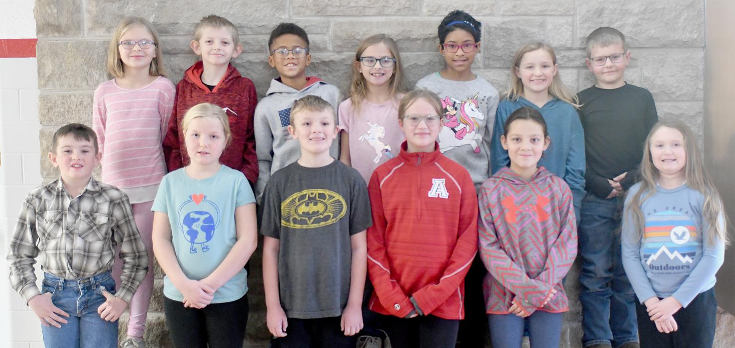 Third Grade Students of Mrs. Sarah Carpenter share what their best Christmas present has ever been that they received or gave. Her students are (Front Row - Left to Right): Barrett Alberts, Rainey Painter, Jackson Moody, Faith Haley, MacKynzi Swett and Sophia Schroedl; and (Back Row - Left to Right): Emma Lambrecht, Daniel Lewis, Myles Fatile, Logan Johnson, Ariyah Voss, Gracie Gillespie and Tripp Hallock.