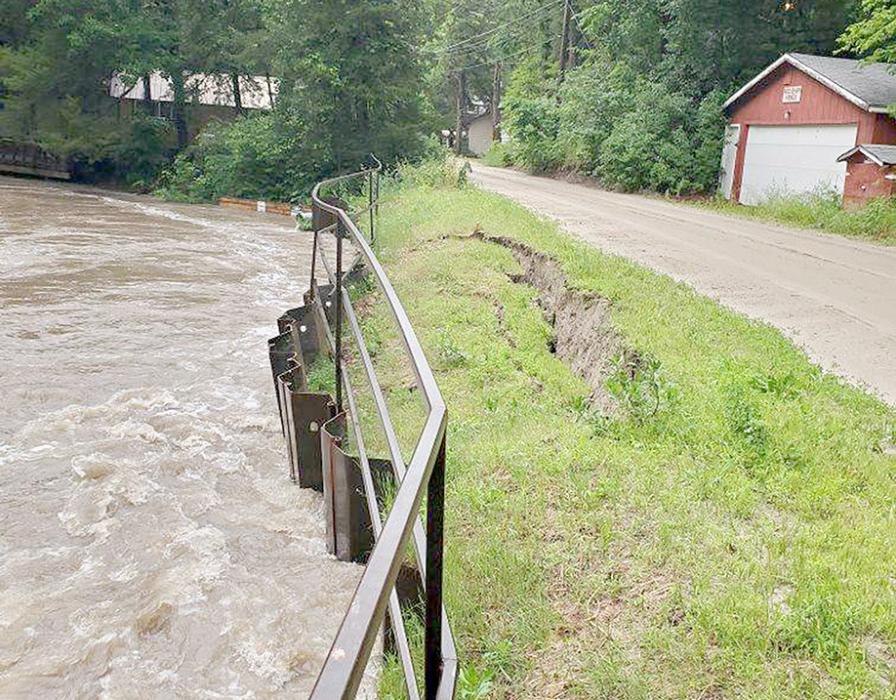 The heavy rain that swept through the area Thursday evening, June 20th, caused problems at Hidden Paradise again. Long Pine Creek was out of its banks Thursday evening and Friday. Brown County Highway Superintendent provided this picture showing the edge of the road moving away from the road bed following the heavy rain.