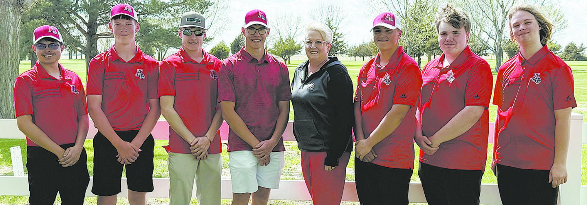 Members of the team this year are (left to right): Colby Beegle, Jaxon Rucker, Jhett Hollenbeck, Aiden Jackman, Coach Julie Mocheel, Carson Koch, David Cook, and Erick Hitchcock.