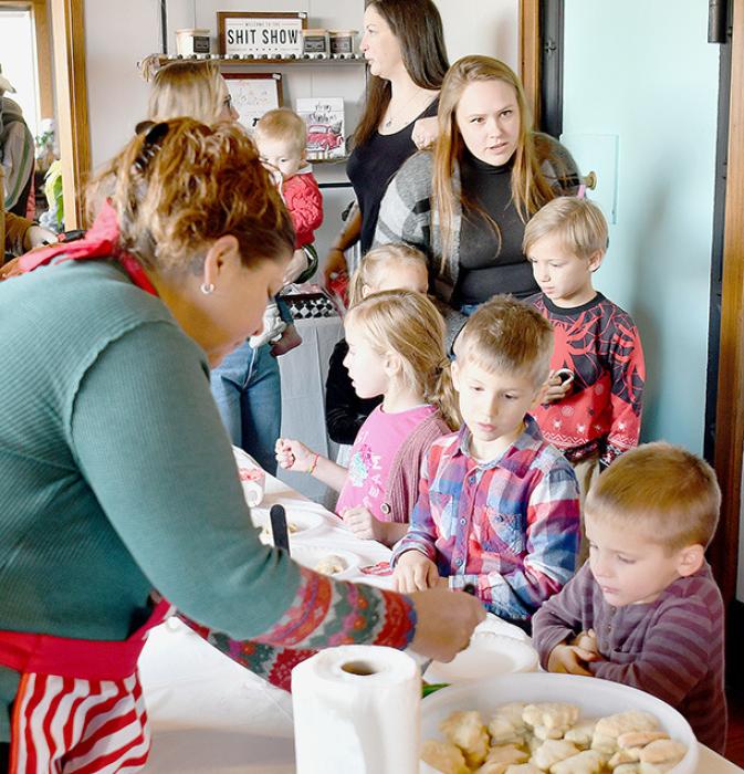 After visting Santa, families were able to decorate a Christmas cookie and have a cup of hot chocolate.