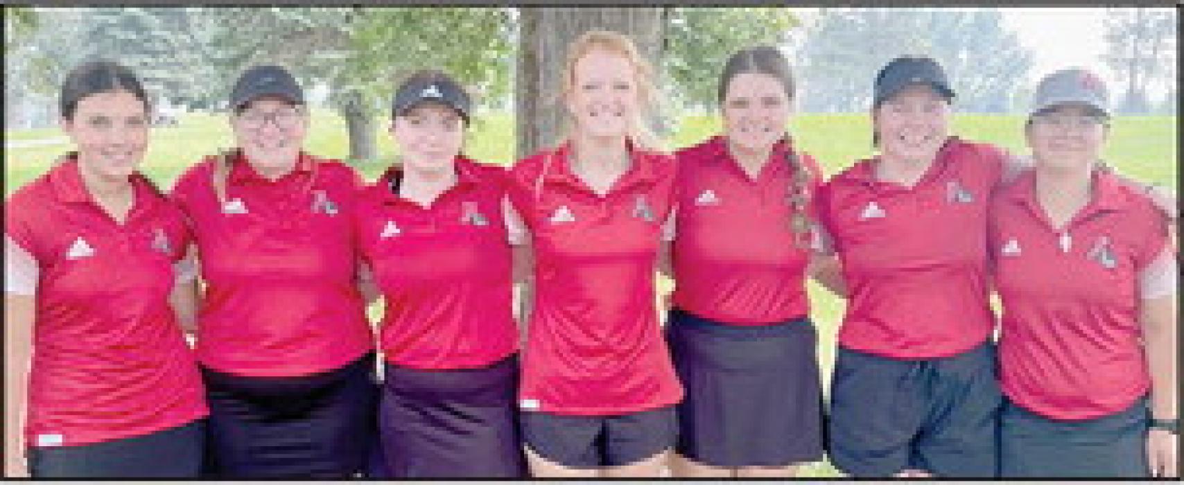 The Ainsworth High School Girls Golf Team of (Left to Right) Braylin Rudnick, Grace Goodwin, Jordan Beatty, Terra Shoemaker, Hannah Beel, Jaden Appleman and Madison Palmer, as they head into the final half of the golf season.