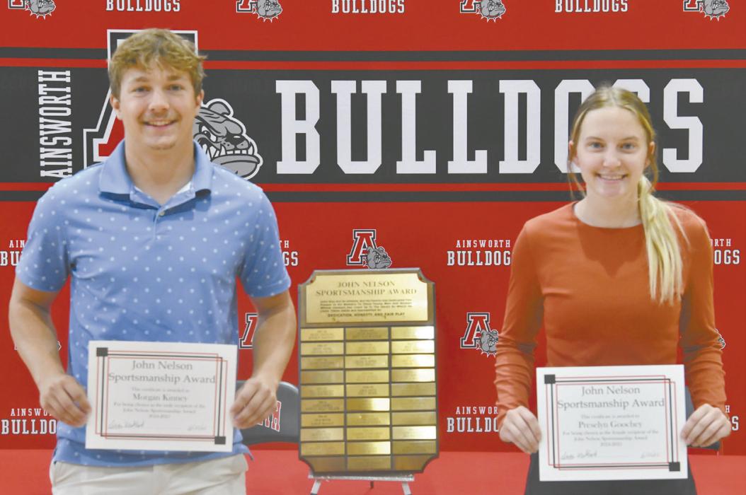 Morgan Kinney and Preselyn Goochey were presented certificates on Monday, June 23, in the Lila McAndrew Gymnasium.