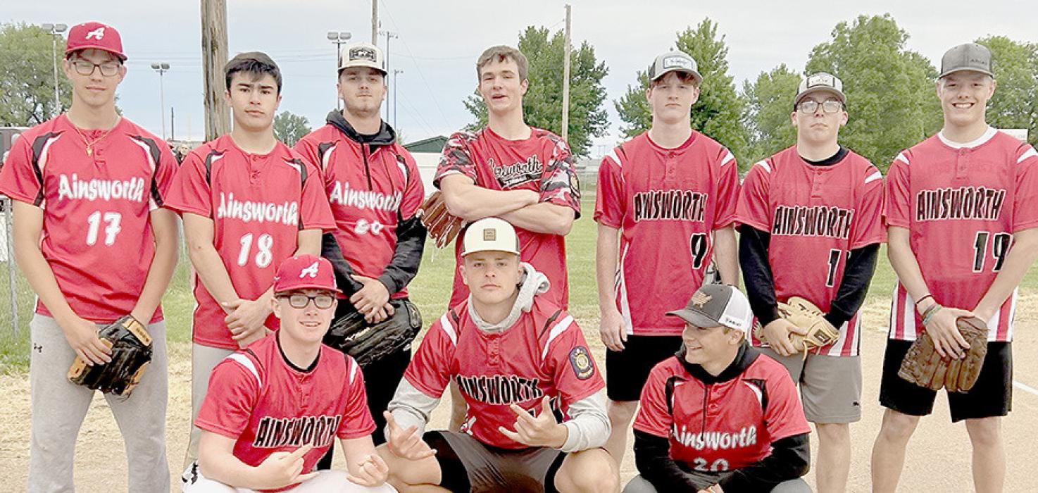 First Class Auto Softball Team members are (Back Row - Left to Right): Aiden Jackman, Chris Fernandez, Jackson Kaup, Logan Schroedl, Sam Titus, Ryan Salzman and Mason Painter; (Front Row - Left to Right): Whitten Painter, Carter Nelson and Morgan Kinney.