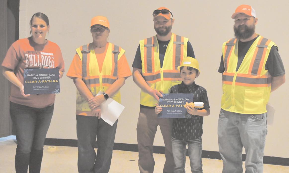 Standing with Brysen Swett during his award ceremony are (left - right): Kelsey Reisen, Brenda Graff, Tyler Ammon, and Shaun Emerson.