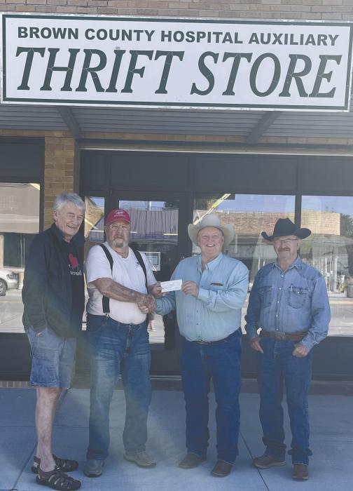 A check was presented to the Brown County Hospital Auxiliary Thrift Store from the Silver Cord Lodge. Attendees of the presentation include (left - right): Evan Evans, Keith Baker, Joe McBride and Mike Baxter.