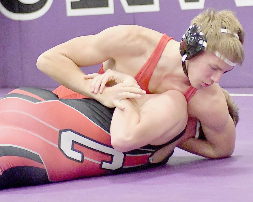 Aiden Jackman pinned Ben Johnson of Creighton in the 165 lb. weight class.
