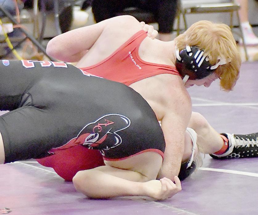 Sam Titus won his first two matches in the 144 lb. weight class at the Burwell Invitational.