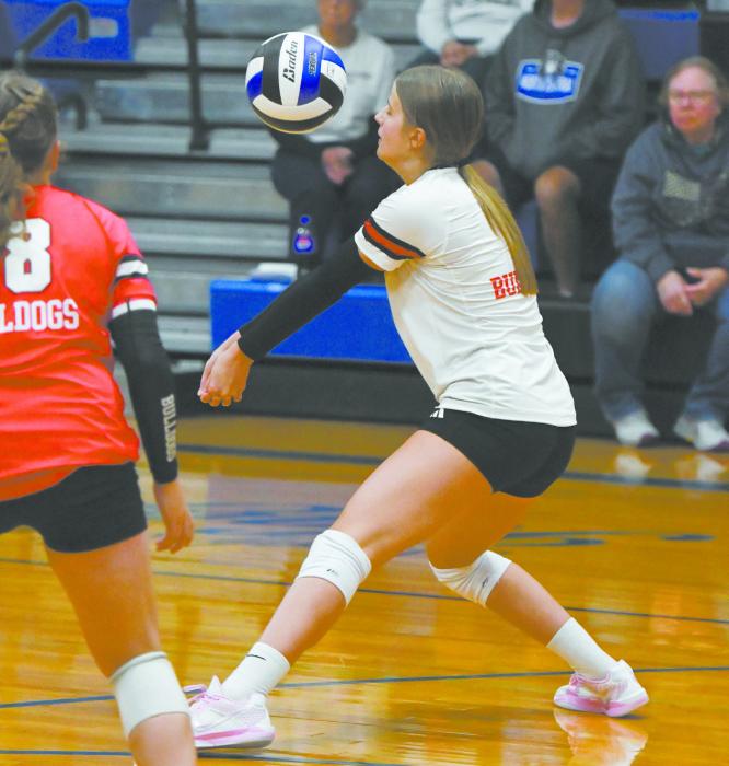 Junior Jaylee Good receives a serve during a match against the North Central Knights. Good has received 238 serves this season.