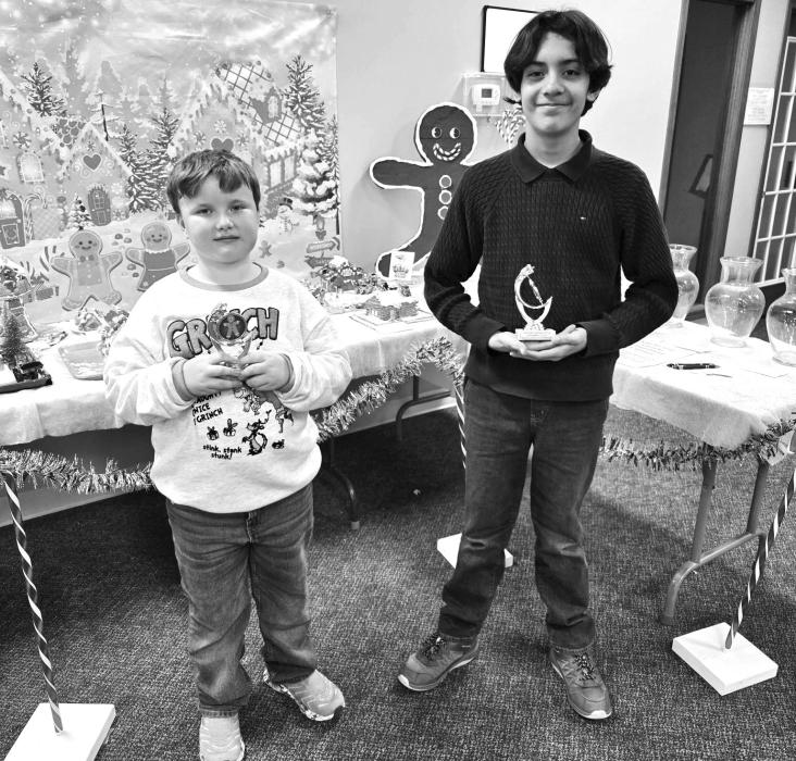 Hunter Bonge (left) and Diego Godoy-Gramajo each won a division of the gingerbread kit contests.